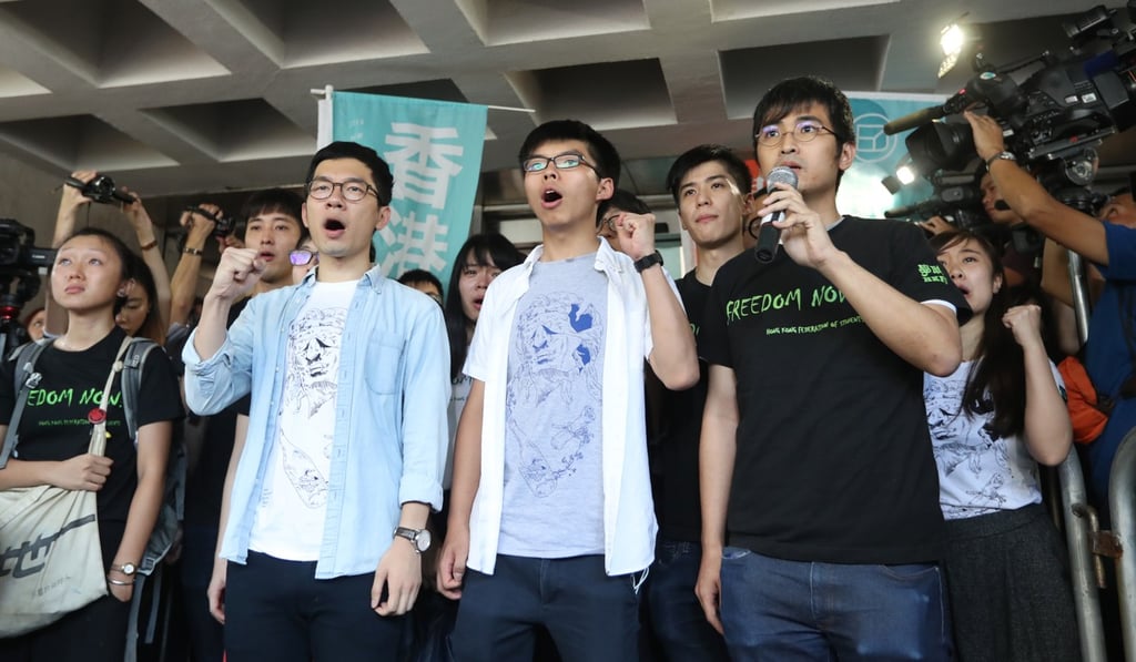(From front left) Nathan Law Kwun-chung, Joshua Wong Chi-fung and Alex Chow Yong-kang appear at the High Court. Photo: Edward Wong