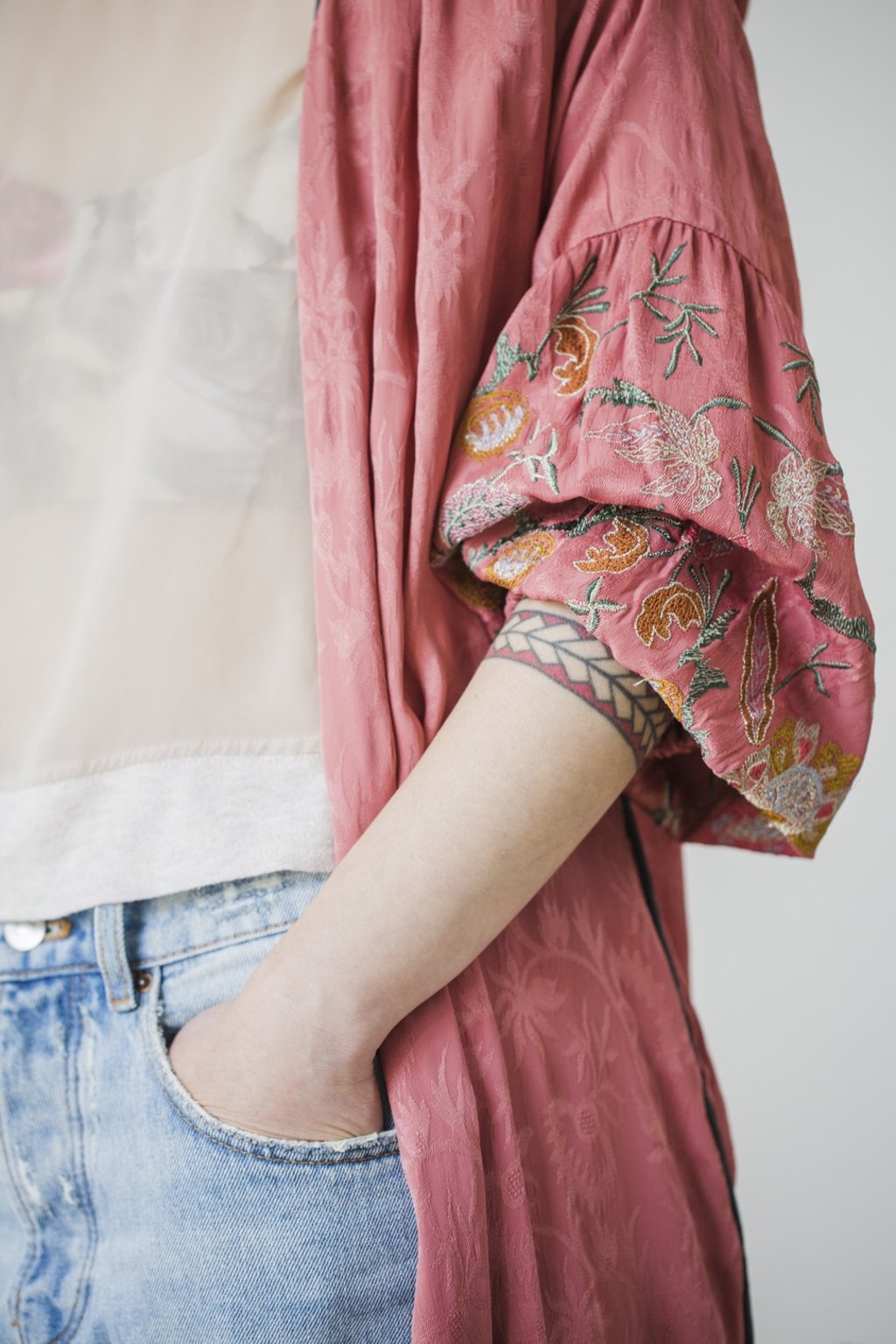 Kwok wears an H&M top, with jeans and robe from Zara. Photo: Michelle Wong