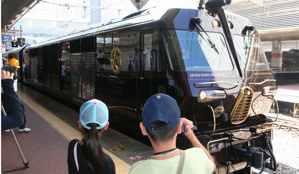 Kyushu Railway Co.'s luxury sleeper train Seven Stars leaves JR Hakata Station in Fukuoka for a four-day trip. Photo: Kyodo
