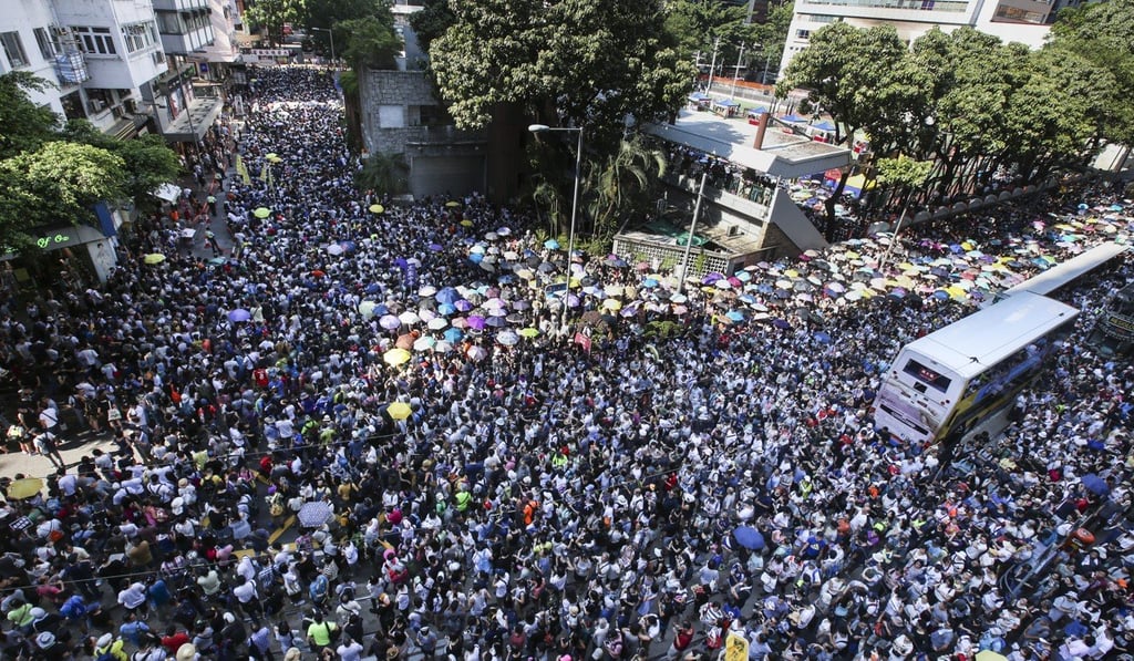 Thousands join a protest rally near Hong Kong’s Southorn Playground on August 20 after the Court of Appeal jailed three leading student activists for six to eight months, as well as 13 others, earlier in the week. Photo: David Wong