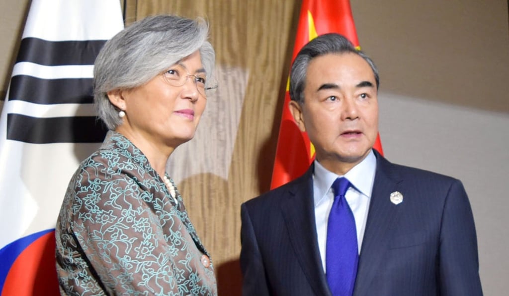 South Korean Foreign Minister Kang Kyung-wha (left) meets her Chinese counterpart Wang Yi in Manila this month. Wang on Thursday told Kang the two nations should work together to tackle Pyongyang’s nuclear ambitions. Photo: Kyodo