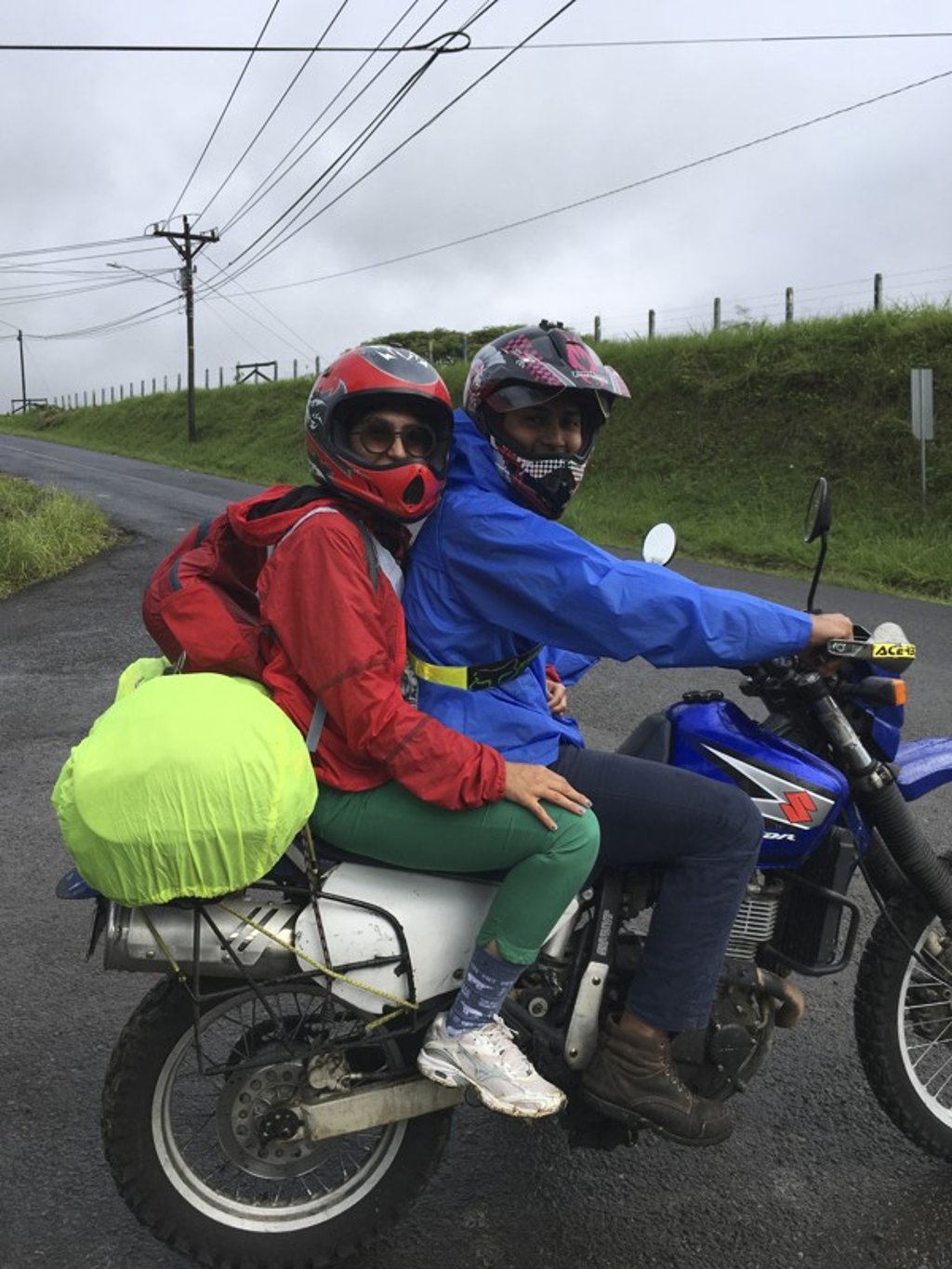 The writer Payal Uttam with her husband, Shriram, on their dirt bike.