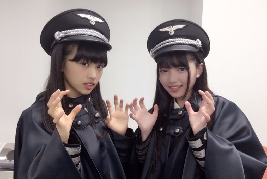 Japanese girl band Keyakizaka46 in costumes modelled on Nazi Waffen-SS uniforms, in 2016. Picture: aramajapan.com