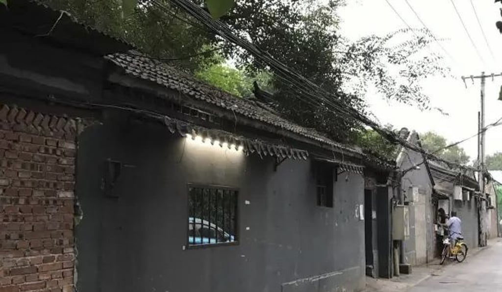 How the art space’s frontage looks today. Artist Yang Zhenzhong has replaced the sliding doors that were Arrow Factory’s shop front with a painted brick wall. Photo: Arrow Factory