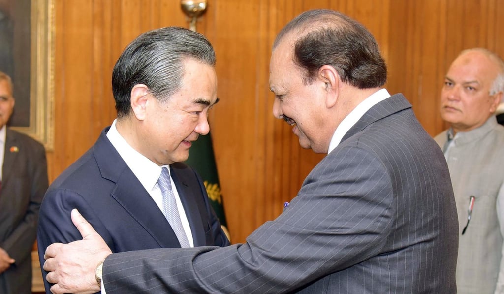 Chinese Foreign Minister Wang Yi meets Pakistani President Mamnoon Hussain in Islamabad. Photo: AFP