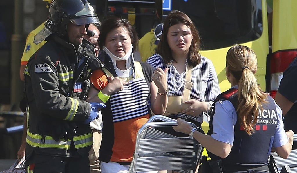 Injured people are treated in Barcelona after the April 17 terror attack on Las Ramblas boulevard. Photo: AP Injured people are treated in Barcelona after the April 17 terror attack on Las Ramblas boulevard. Photo: AP