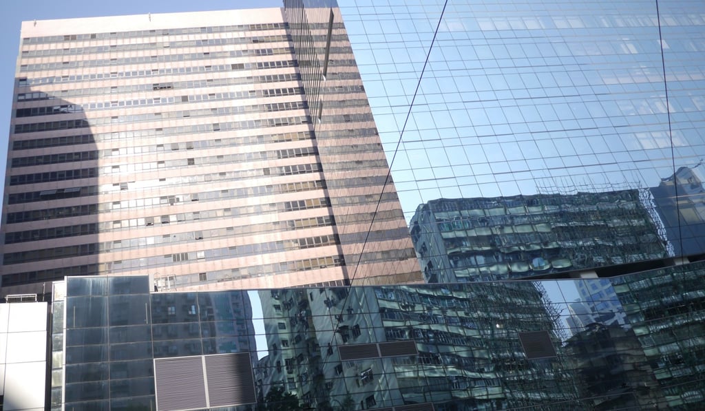 Office buildings in North Point. Business accommodation rental is one huge concern for SMEs. Many professionals keep costs to a minimum at the outset by working from home. But this is not always a feasible option. Photo: Martin Chan