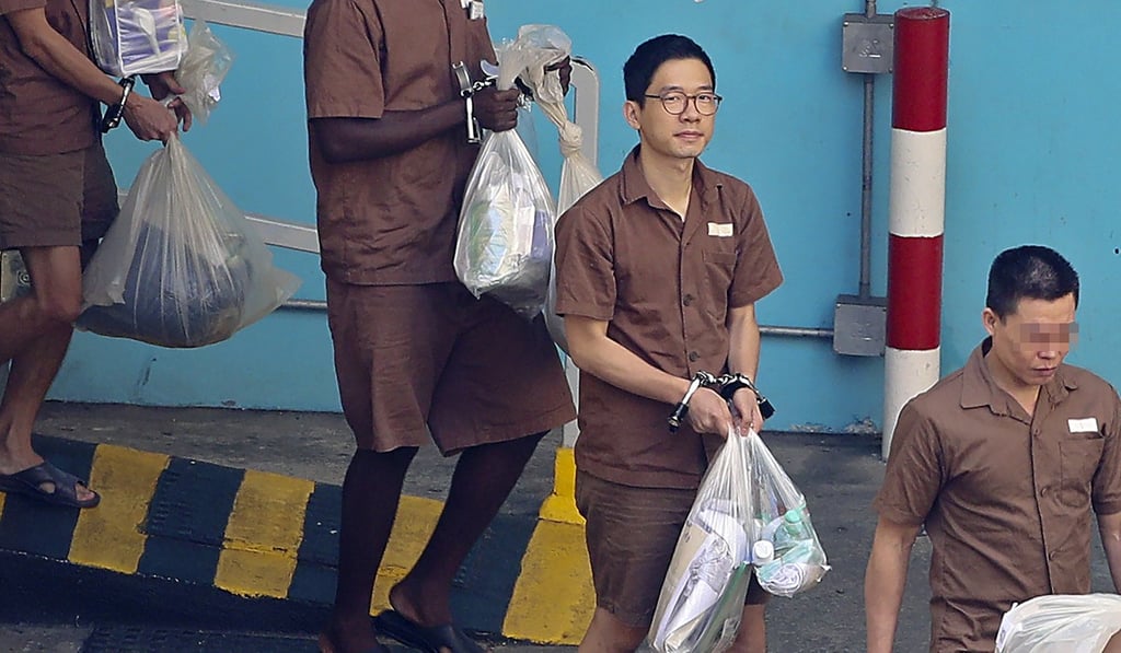 Nathan Law is escorted away from Lai Chi Kok Reception Centre. Photo: Handout