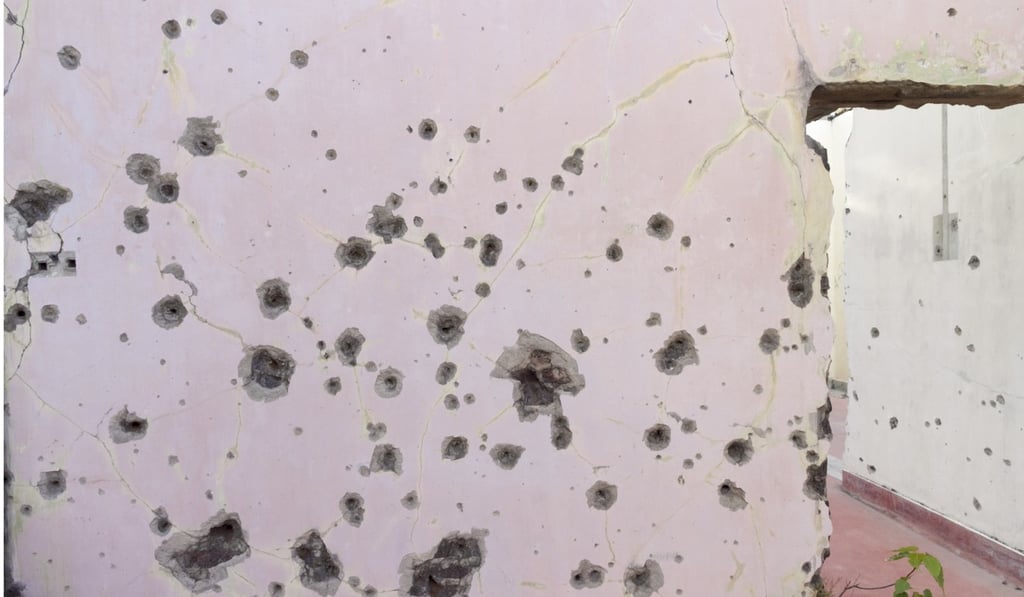 A bullet-ridden and badly damaged ruin of the old British built railway station in Jaffna.