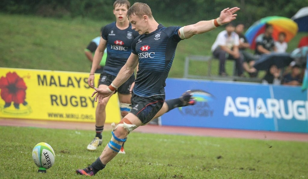Matt Worley launches a kick during the Asia Rugby U19 Championship in Kuala Lumpur in December. Photo: HKRU