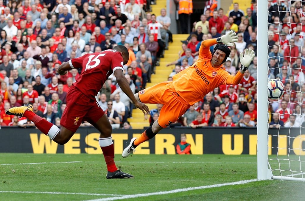 Liverpool’s Daniel Sturridge caps off his team’s win with the fourth goal. Photo: Reuters