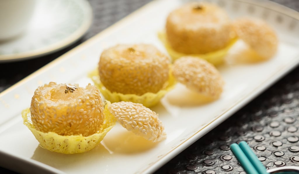 Crispy sesame ball filled with egg yolk custard and bird’s nest