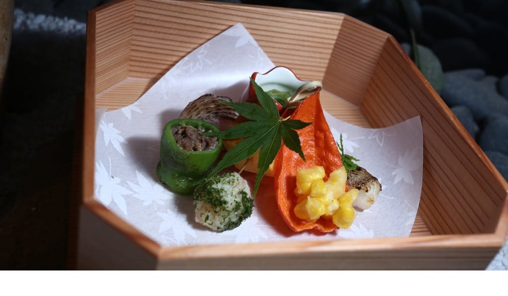 Taro stem with sea urchin, lobster, peas, wasabi and shiso flowers. Photo: Jonathan Wong