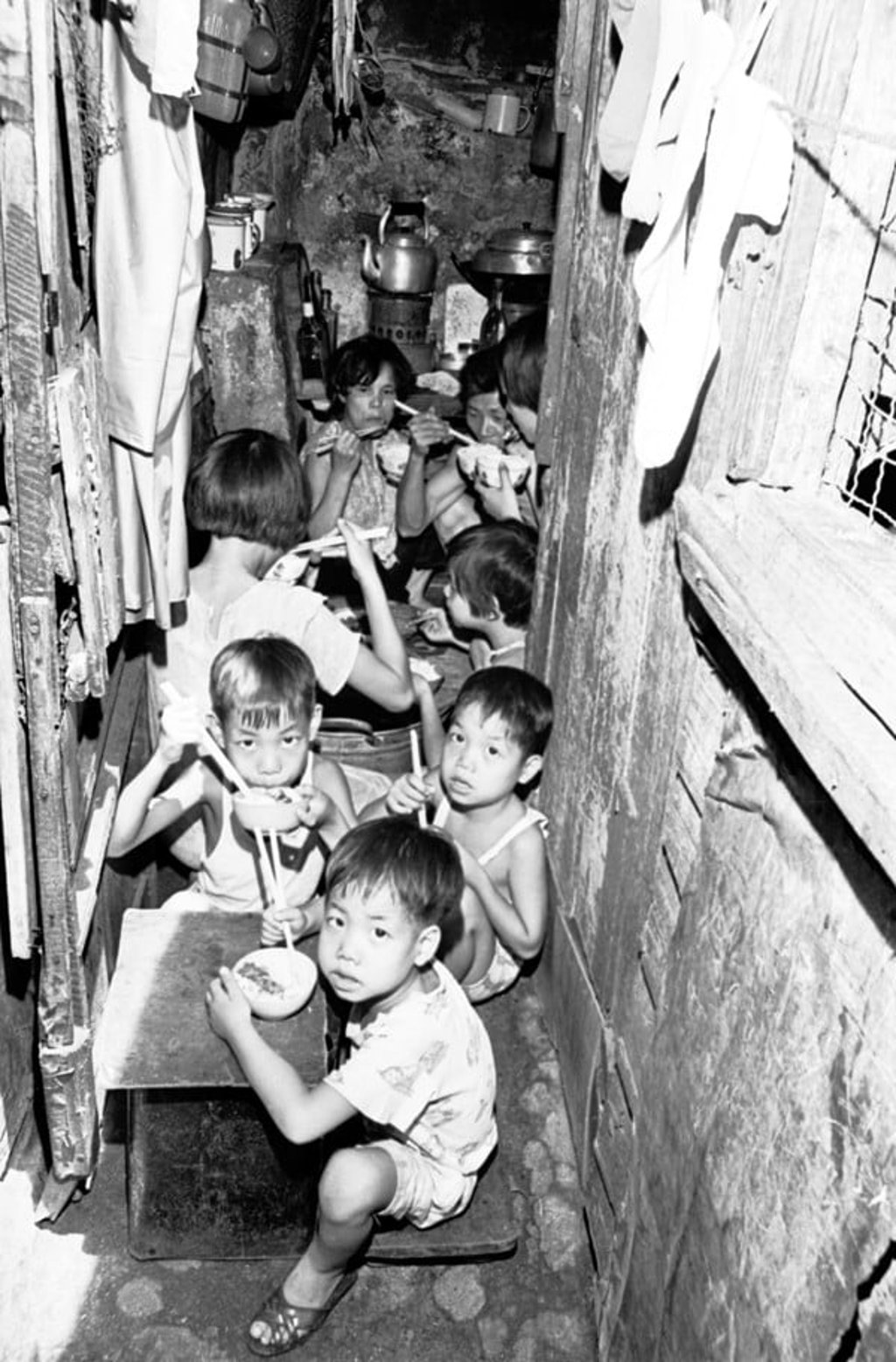 A cramped Hong Kong family home in the 1960s.