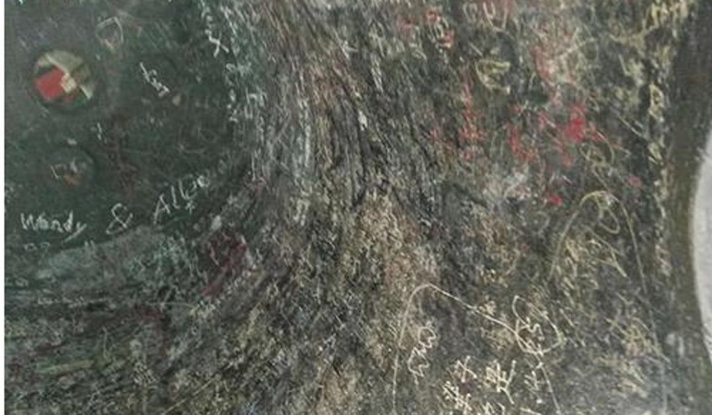 A photograph of the inside of the bell shows the not so poetic inscriptions. Photo: Handout