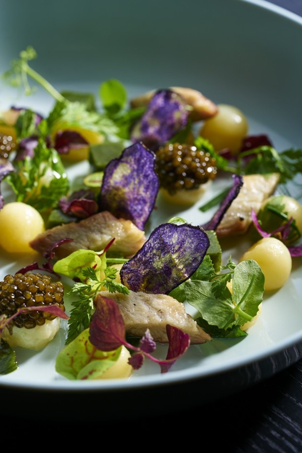 Kristal gold caviar with smoked eel and potatoes at Le 39V