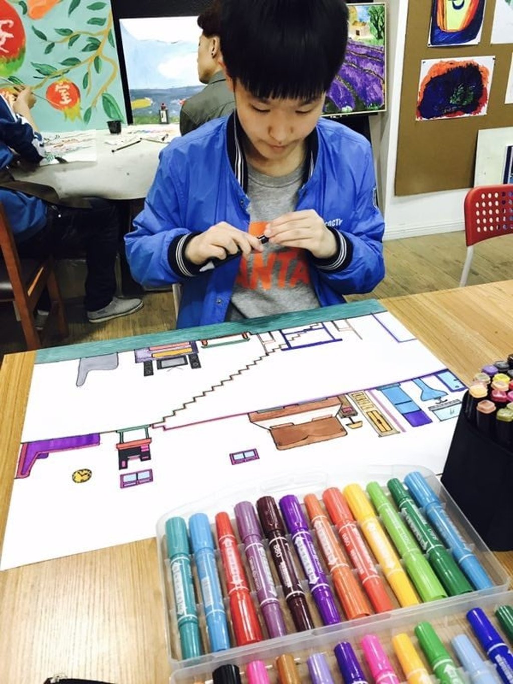 A child at one of the WABC’s art classes. Some 36 paintings were on sale in the charity campaign. Photo: Handout A child at one of the WABC’s art classes. Some 36 paintings were on sale in the charity campaign. Photo: Handout