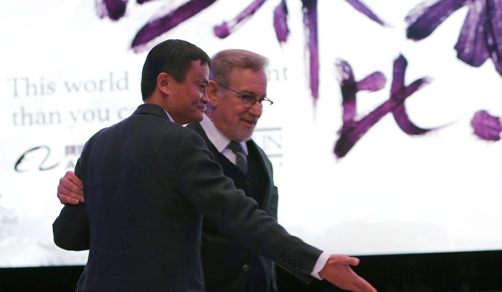 Jack Ma Yun (L), executive chairman of Alibaba Group Holding, gestures to film director Steven Spielberg, the chairman of Amblin Partners, during an event to announce partnership between Alibaba Pictures Group Limited and Amblin Partners, in Beijing, China, in October 2016. Photo: Reuters