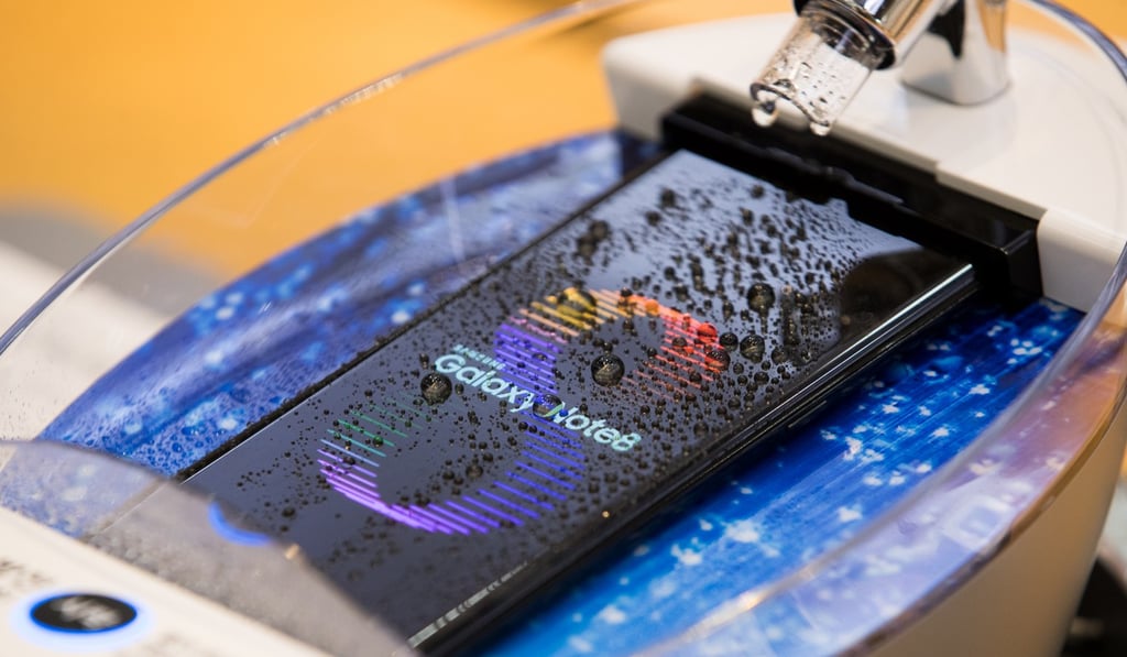 Water droplets sit on the screen of a Samsung Galaxy Note 8 to show its water-resistant capabilities at a store in Seoul. The stakes are high for Samsung's rollout of the Note 8, after the previous model's exploding battery fiasco. Photo: Bloomberg Water droplets sit on the screen of a Samsung Galaxy Note 8 to show its water-resistant capabilities at a store in Seoul. The stakes are high for Samsung's rollout of the Note 8, after the previous model's exploding battery fiasco. Photo: Bloomberg