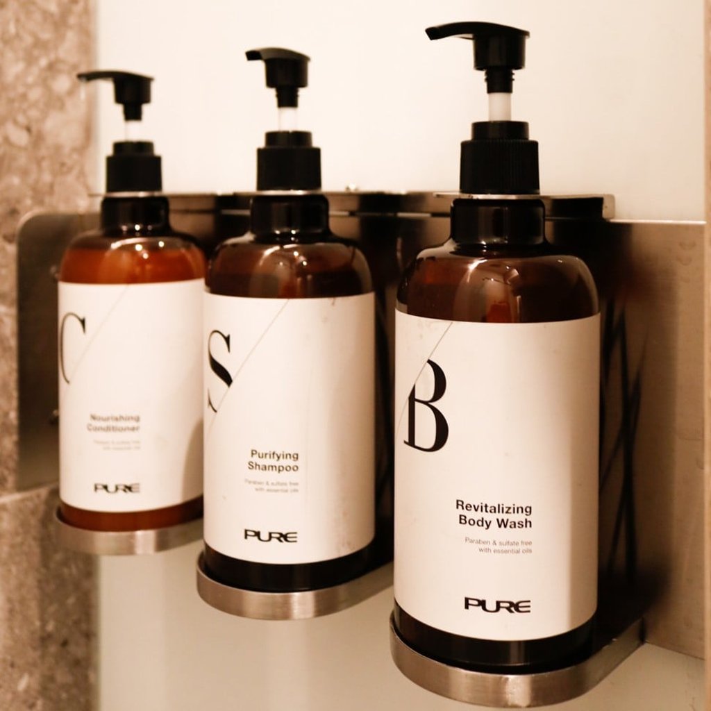 The showers at the new yoga studio feature all-natural toiletries with essential oils.
