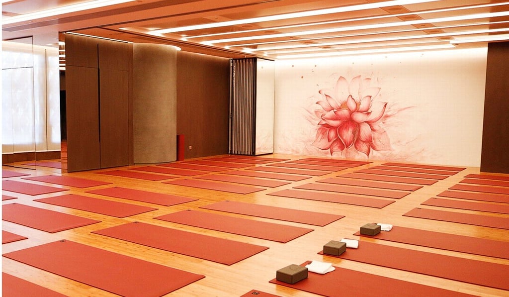 Pure Yoga’s new studio offers more than 120 classes each week.