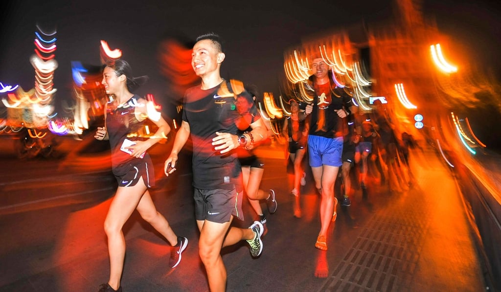 A growing number of young, educated, urban Chinese are shrugging off the myriad hazards to keep fit through serious running and the number of marathons and running events in the country is mushrooming. Photo: AFP A growing number of young, educated, urban Chinese are shrugging off the myriad hazards to keep fit through serious running and the number of marathons and running events in the country is mushrooming. Photo: AFP
