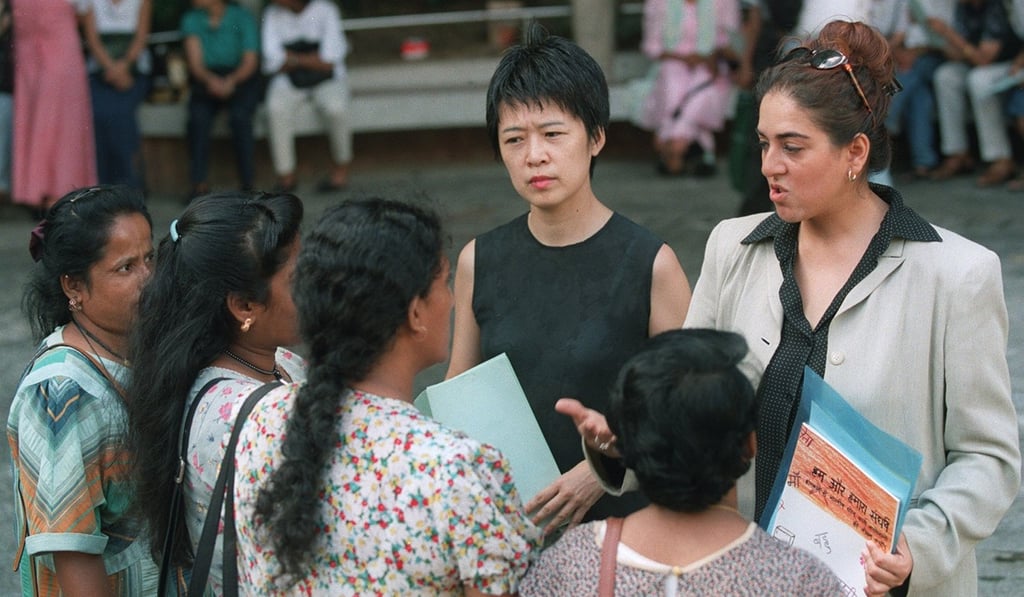 Tammy Cheung and lawyer Vandana Rajwani talk to Indian women for Cheung’s film Invisbile Women. Photo: Dustin Shum