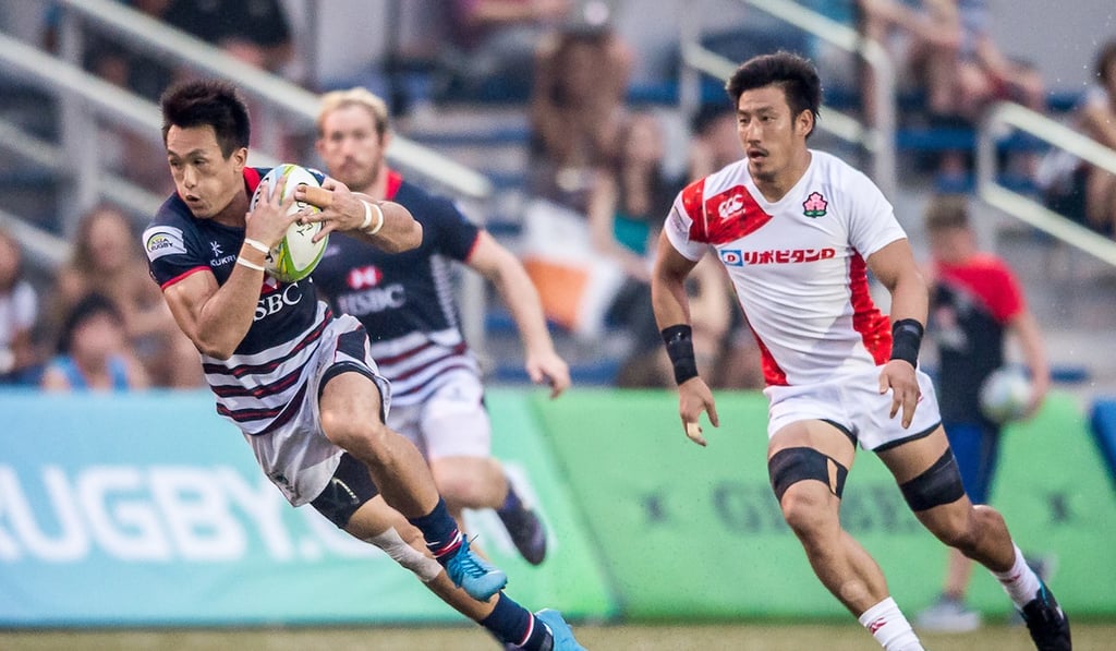Salom Yiu surges forward during Hong Kong's loss to Japan.