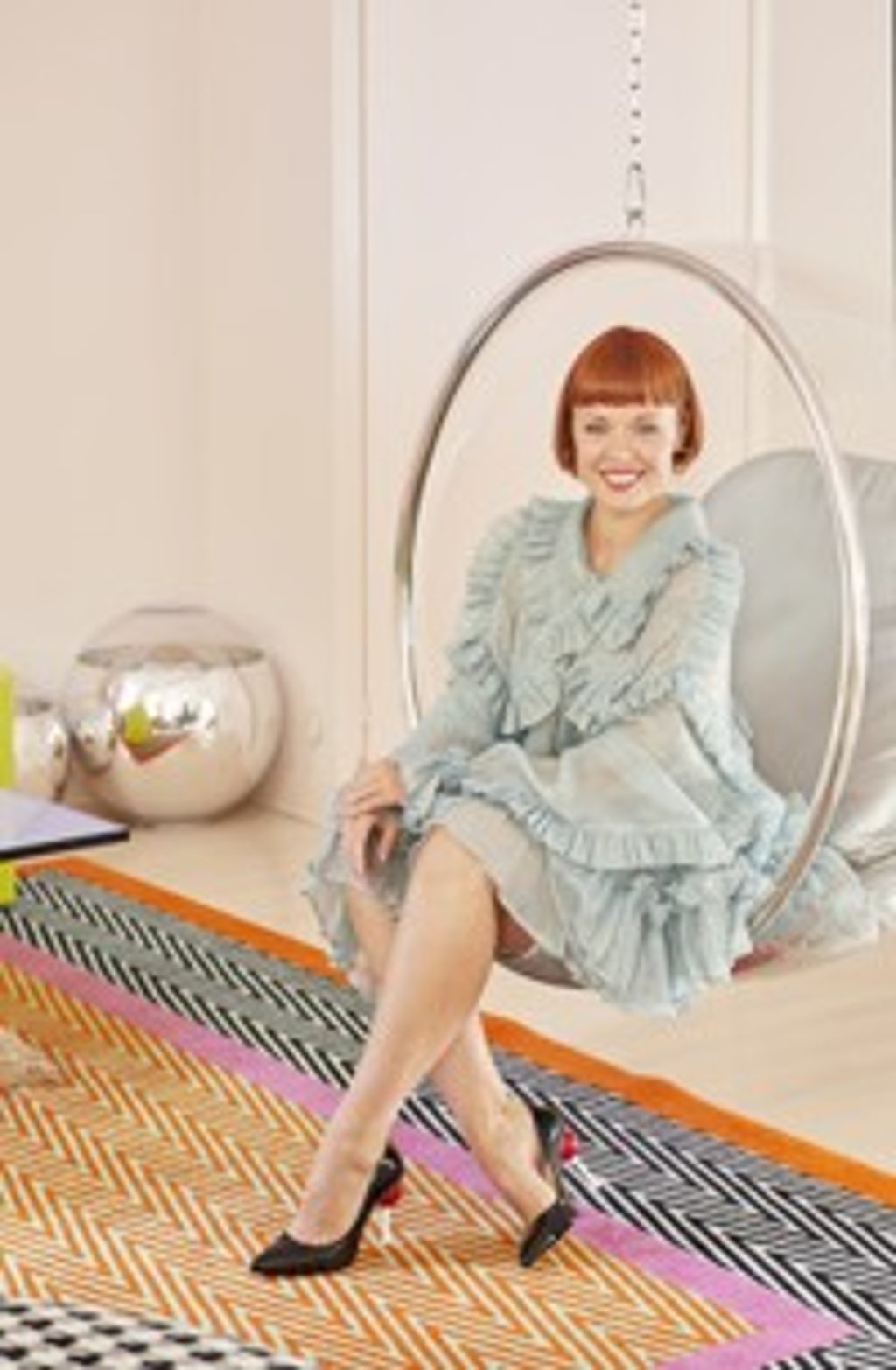 Minna Parikka in her hanging bubble chair. Photos: Living Inside / Katri Kapanen