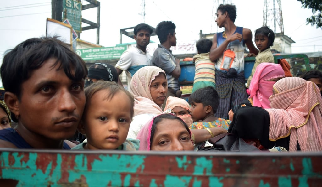 Rohingya refugees on a truck on the Teknaf-Cox's Bazar highway in Ukhiya, Bangladesh. Photo: AFP