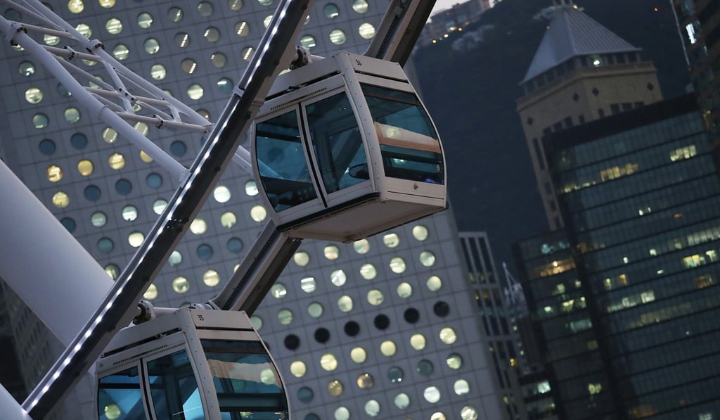Cars on the Hong Kong Observation Wheel sits empty in Central after the operator's contract expired on Monday, August 28. Photo: Nora Tam