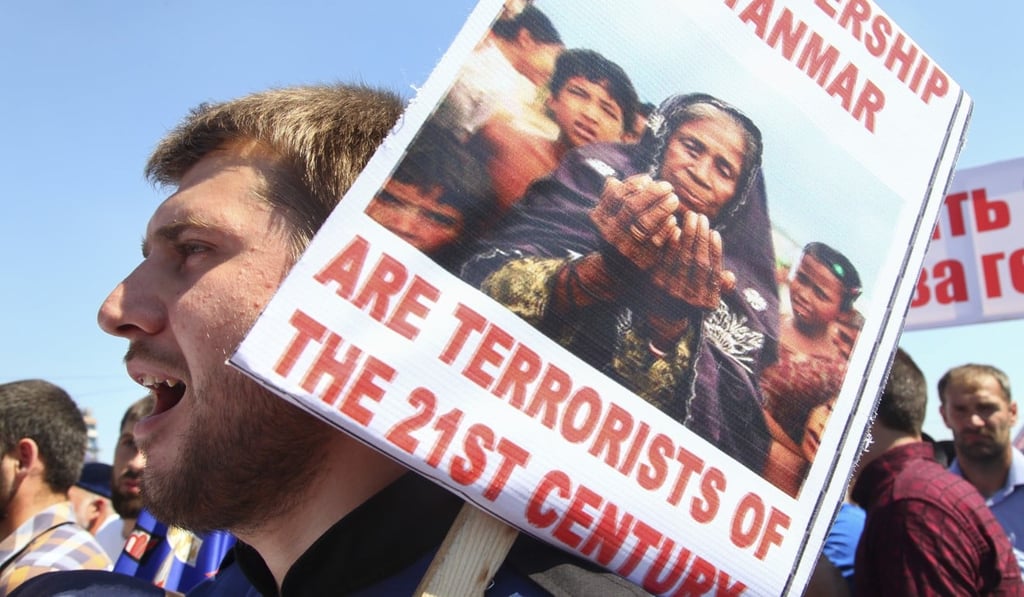 A Chechen man chats slogans during a mass protest against Myanmar’s “genocide” of the Rohingya minority, in Chechnya's provincial capital Grozny on Monday. Photo: AP A Chechen man chats slogans during a mass protest against Myanmar’s “genocide” of the Rohingya minority, in Chechnya's provincial capital Grozny on Monday. Photo: AP