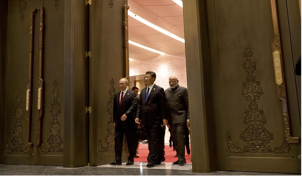 President Xi Jinping leads his guests, Russian President Vladimir Putin and Indian Prime Minister Narendra Modi, into a meeting on the sidelines of the BRICS Summit in Xiamen, Fujian province, on September 5. China wants to be accepted as China, not as an honorary member of the West. Photo: AFP President Xi Jinping leads his guests, Russian President Vladimir Putin and Indian Prime Minister Narendra Modi, into a meeting on the sidelines of the BRICS Summit in Xiamen, Fujian province, on September 5. China wants to be accepted as China, not as an honorary member of the West. Photo: AFP