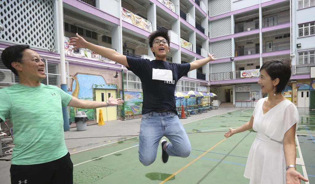 Sum Bo-hei (centre) with his father Patrick Sum Siu-yuk and mother Janet Woo Kit-Fong at Fortress Hill Methodist Secondary School. Encouraging children and building their confidence starts at home. Photo: Xiaomei Chen
