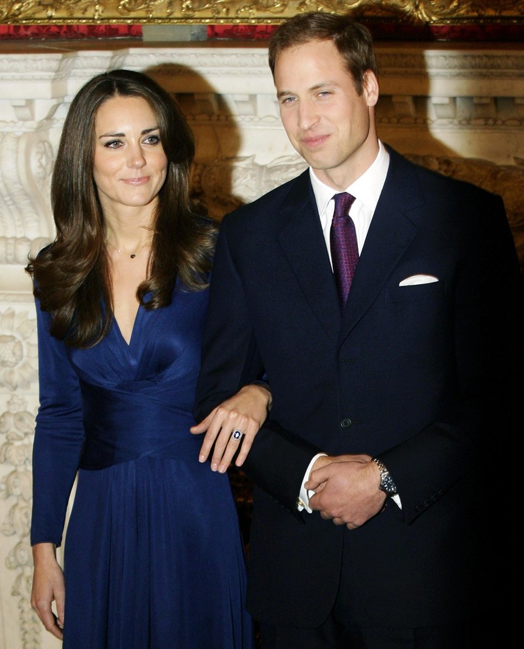 Just engaged! Britain's Prince William (right) and Kate Middleton, wearing an Issa wrap dress, at St James's Palace in London, in November 2010. Picture: EPA