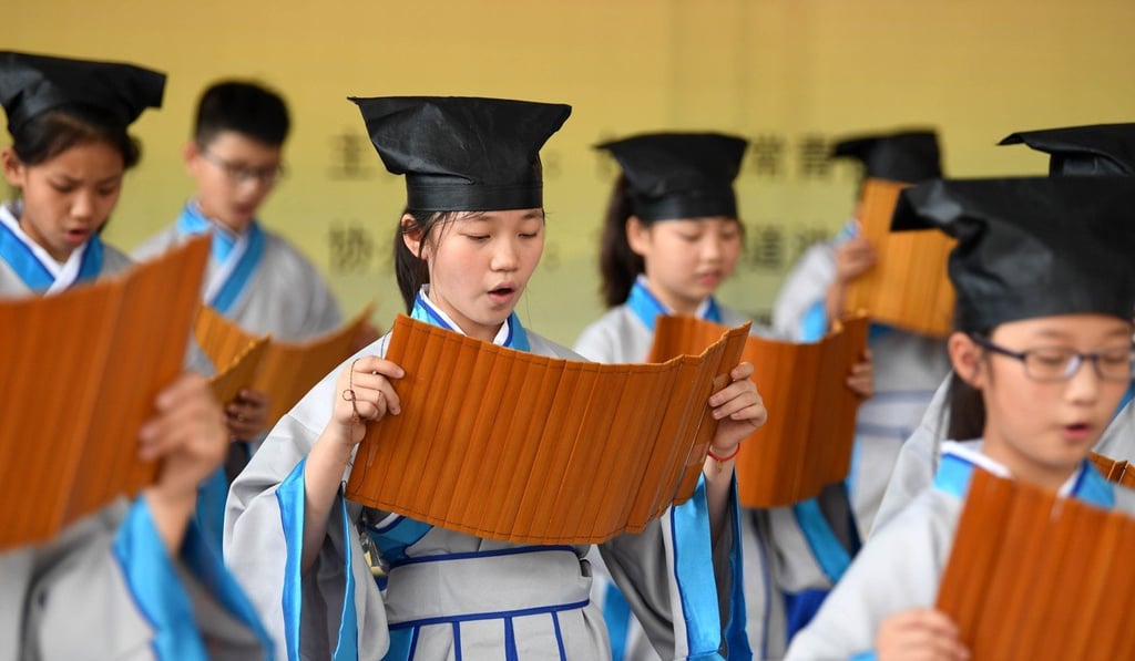 Students recite the classics during an activity to greet the new semester at Shuguang Primary School in Hefei, capital of Anhui Province, on August 30. Photo: Xinhua Students recite the classics during an activity to greet the new semester at Shuguang Primary School in Hefei, capital of Anhui Province, on August 30. Photo: Xinhua