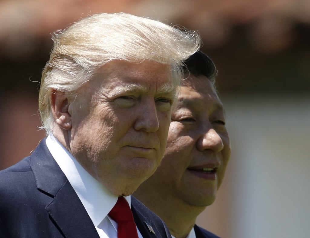 US President Donald Trump (left) and President Xi Jinping walk together at Trump’s Mar-a-Lago estate in Palm Beach, Florida in April. Photo: AP