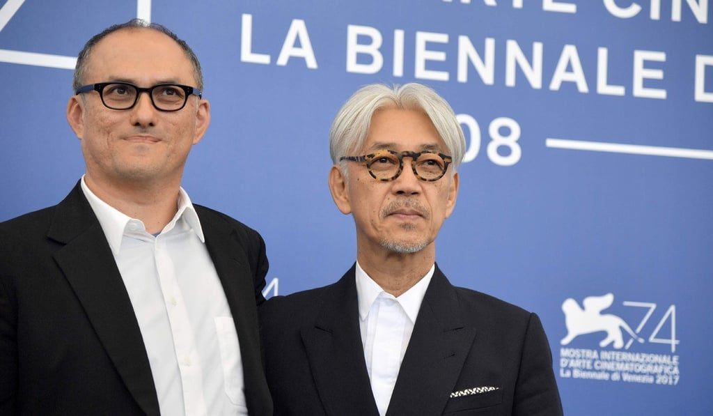 Sakamoto (right) with Coda director Stephen Nomura Schible. Photo: AFP