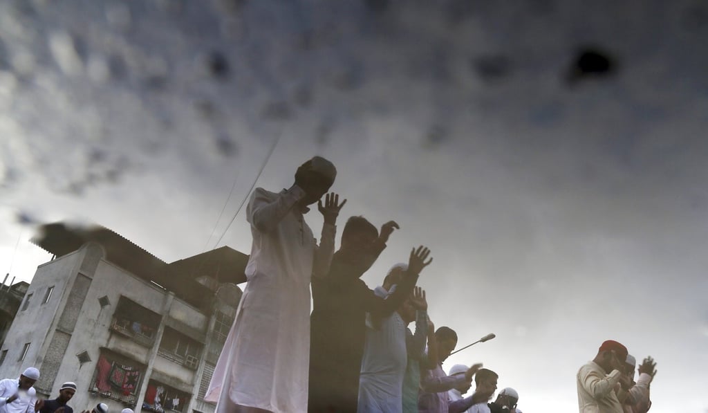Indian Muslims offer prayers on the occasion of Eid al-Adha at Al Shams mosque on the outskirts of Mumbai on September 2. Photo: EPA Indian Muslims offer prayers on the occasion of Eid al-Adha at Al Shams mosque on the outskirts of Mumbai on September 2. Photo: EPA