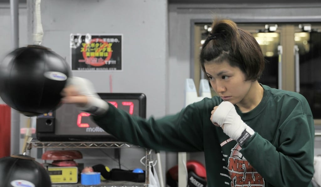 Ayumi Goto works the double end bag at Watanabe Boxing Gym in Tokyo. Photo: Unus Alladin