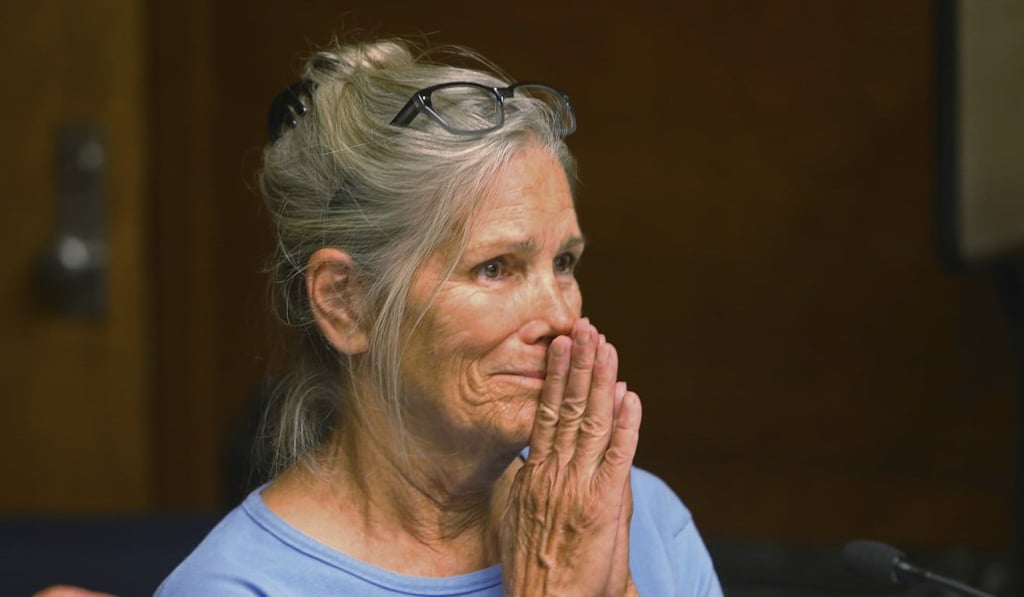 Leslie Van Houten reacts after hearing she is eligible for parole during a hearing on Wednesday. Photo: AP