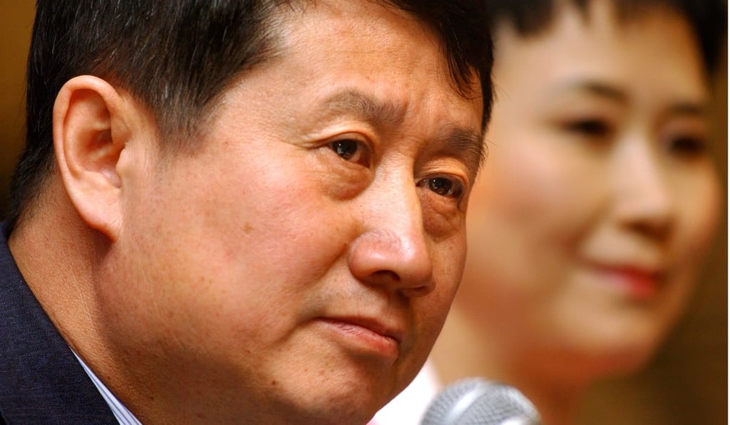 Wang Binghua (foreground), chairman of State Power Investment Corp, hinted at more industry consolidation. Photo: Jonathan Wong