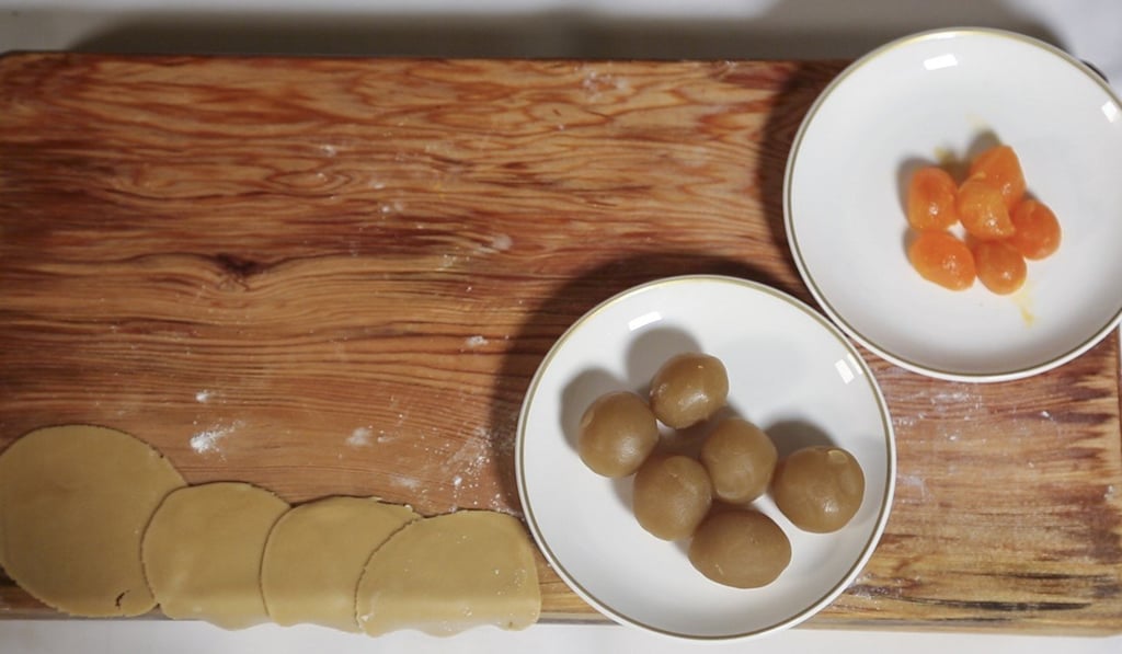 Wrappers, lotus seed paste and salted egg yolks.