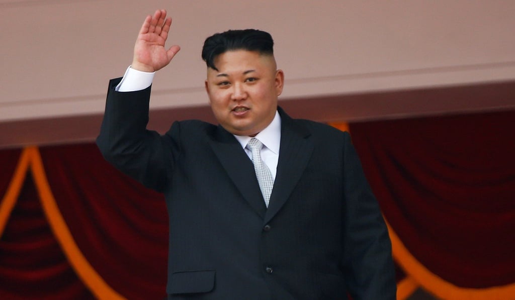 North Korean leader Kim Jong-un waves to people attending a military parade marking the 105th anniversary of the country's founding father, Kim Il Sung in Pyongyang on April 15, 2017. Photo: Reuters