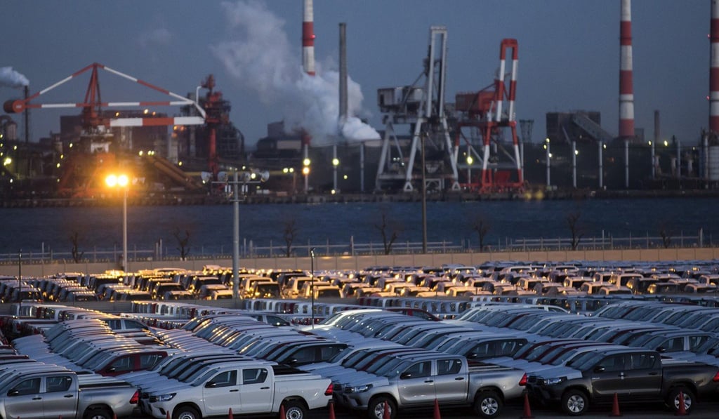 Toyota Hilux pick-up trucks bound for shipment sit parked at the Nagoya Port in Japan. Toyota is an obvious Asian success story in terms of its global footprint. Photo: Bloomberg