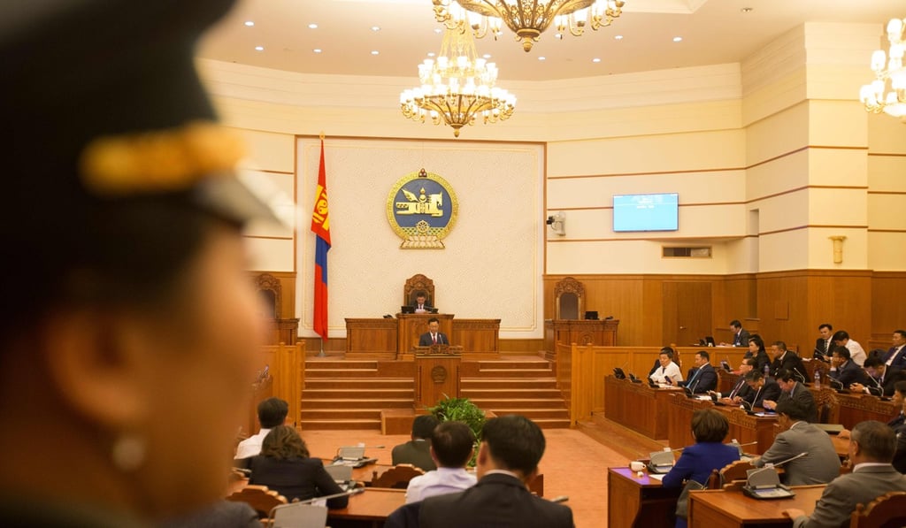 Of 73 members of parliament attending the vote, 42 were in favour of removing Jargaltulgiin Erdenebat along with his 15 cabinet ministers. Photo: AFP