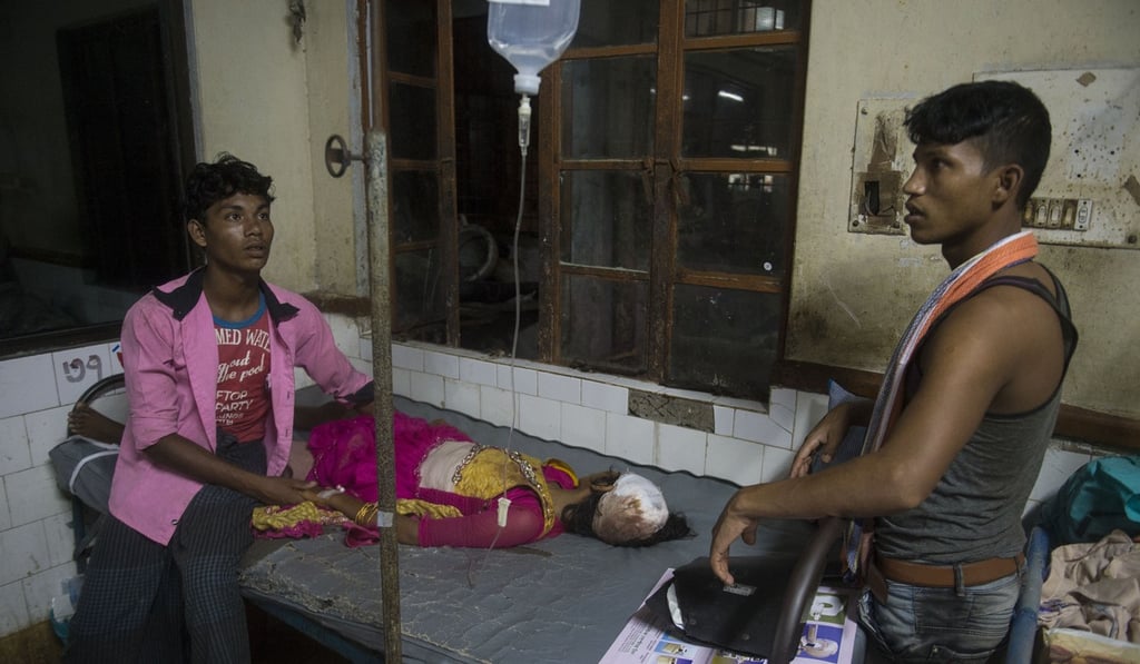 Rohingya refugee Shuktara rests on a bed Chittagong Medical College hospital. Photo: AFP