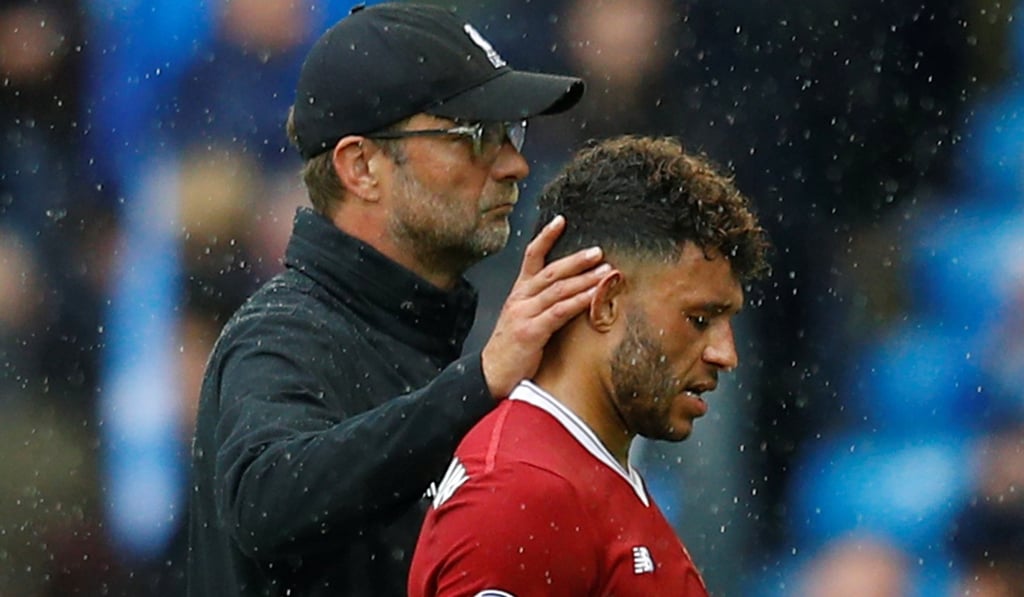 Alex Oxlade-Chamberlain (right) had a debut to forget with Liverpool. Photo: Reuters