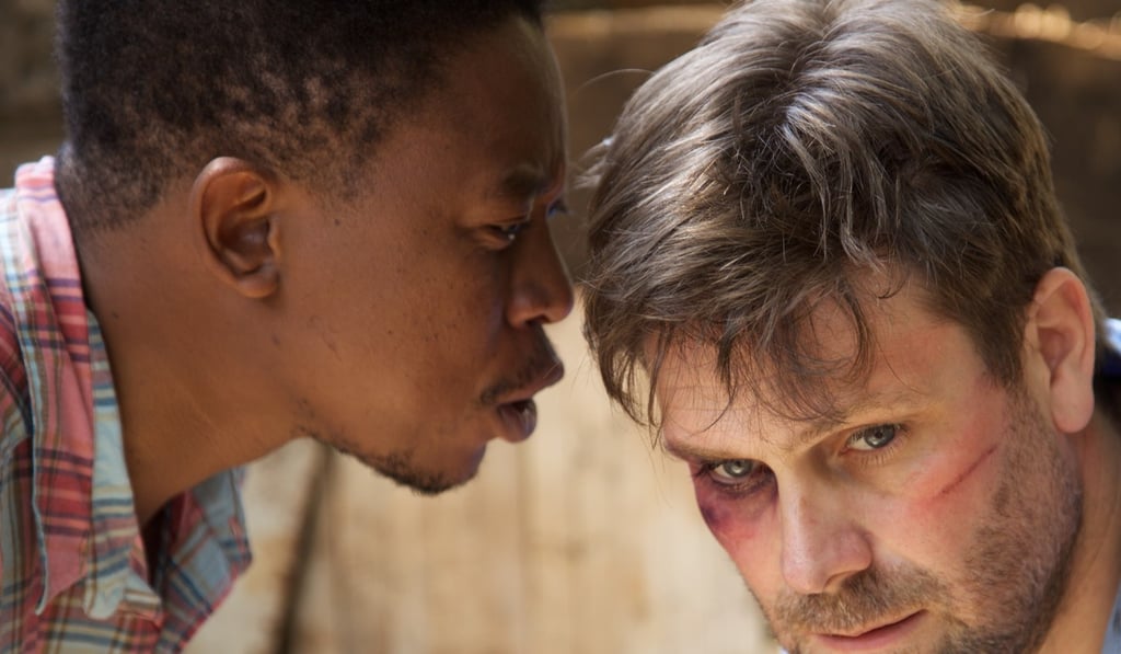 Captor and hostage wrestle with critical questions in the award-winning play A Man Like You by The Theatre Company of Kenya.