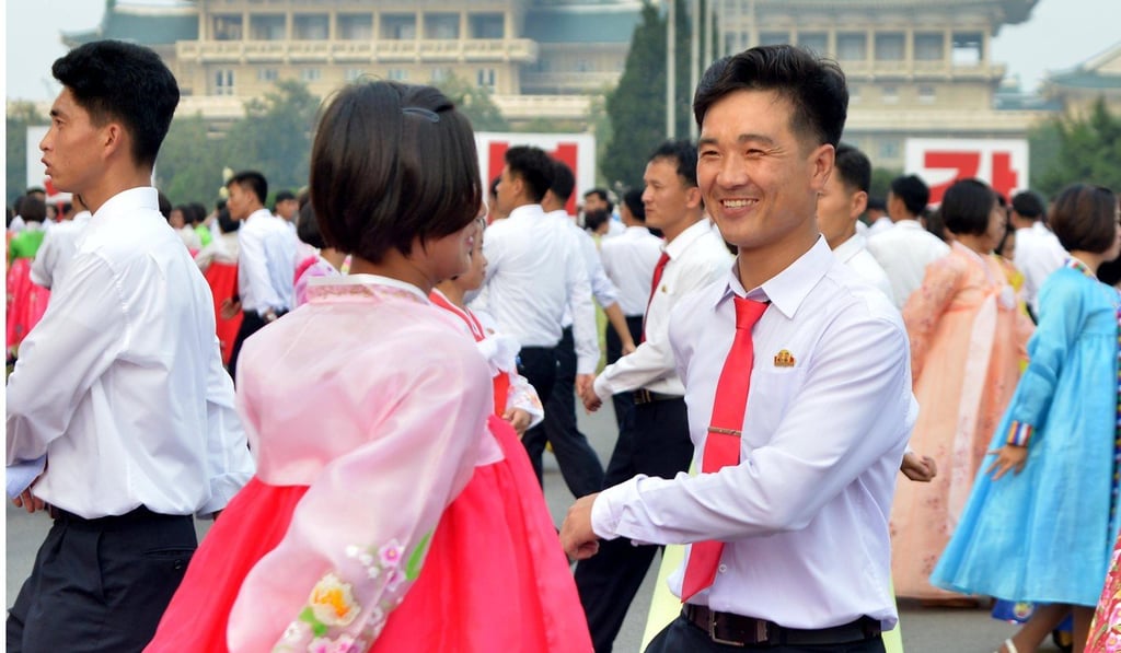 North Koreans dance at an event in Pyongyang on Saturday to celebrate the 69th anniversary of the North Korean government's establishment. Can negotiations ensure a united and neutral Korean peninsula? Photo: EPA-EFE/Yonhap North Koreans dance at an event in Pyongyang on Saturday to celebrate the 69th anniversary of the North Korean government's establishment. Can negotiations ensure a united and neutral Korean peninsula? Photo: EPA-EFE/Yonhap